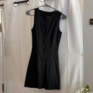 Black Sleeveless Dress
Never worn
